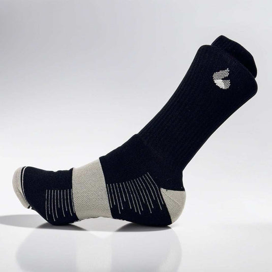 Black and grey tennis socks with seamless toe design and arch support.