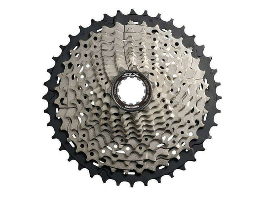 SHIMANO SLX CS-M7000 11-speed 11-42T cassette with aluminum and steel for durability and precise shifting.